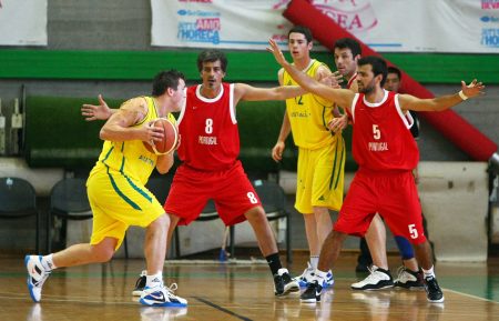 A group of basketball players on the court