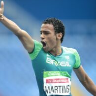 Daniel Martins points to the crowd as he celebrates winning